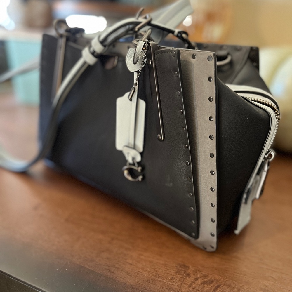 Coach Dreamer color block with rivets. Grey navy. Gunmetal hardware.
